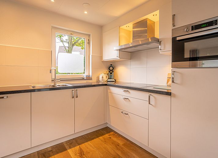 Enjoy the outdoor space of Holiday home Kamperfoelie 43 with sauna, located in green De Koog on Texel.