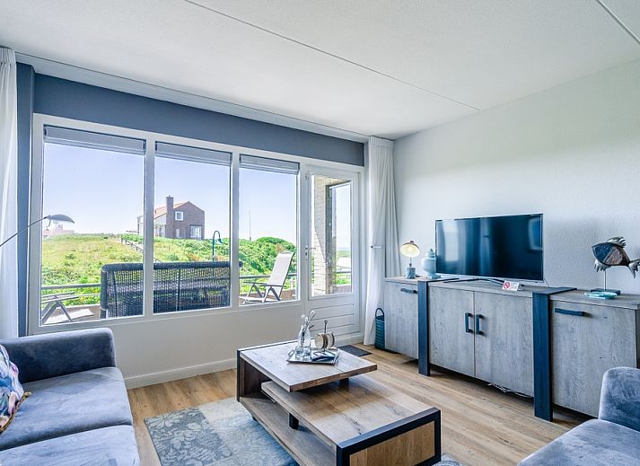 Cozy living room in Apartment Juliana 042 with beautiful views of nature in De Koog, Texel, Wadden Islands.