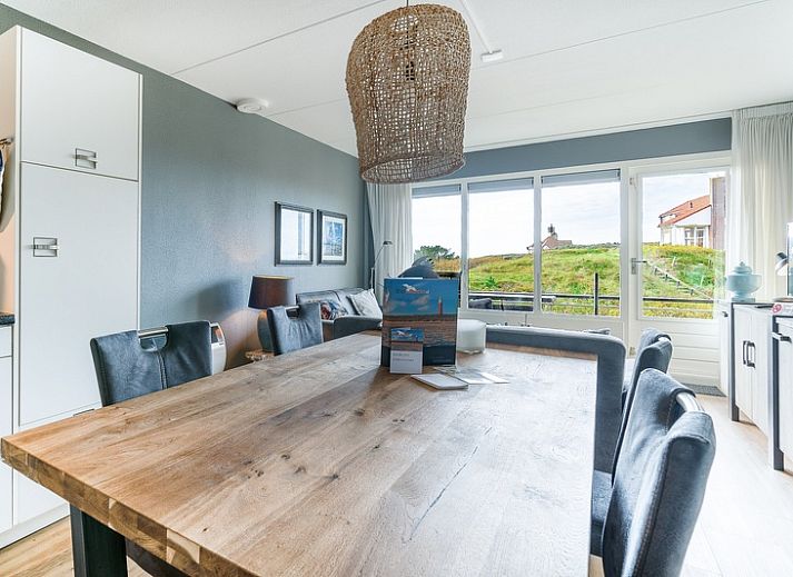 Stylish living room of Apartment Juliana 042 overlooking De Koog, Texel, ideal for a relaxing stay.