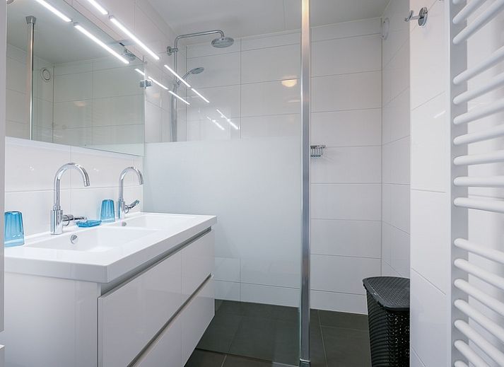 Stylish living room of Apartment Juliana 042 overlooking De Koog, Texel, ideal for a relaxing stay.