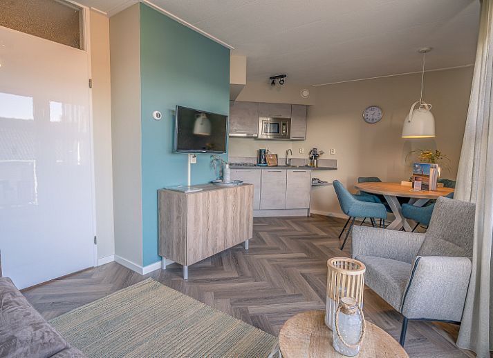 Cozy living room overlooking terrace in Apartment Zeedistel 24, De Koog, Texel.