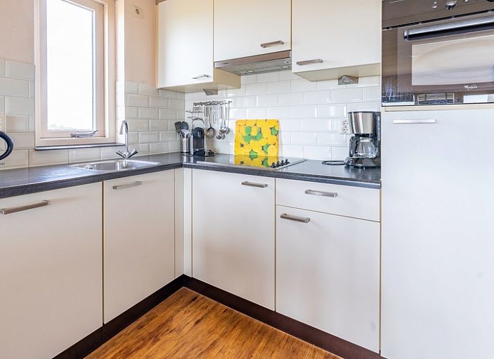 Bright living room of Apartment Juliana 168 Zeezicht, De Koog Texel, overlooking the dunes and sea.