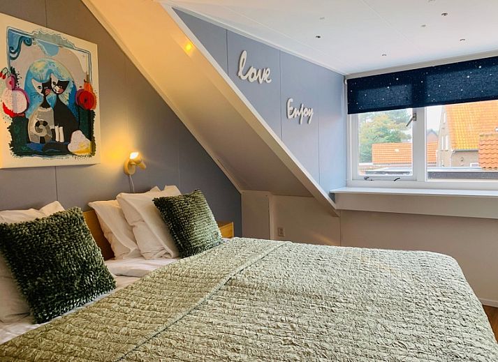 Cozy bedroom in Texel A, De Koog, with double bed and attractive decoration.