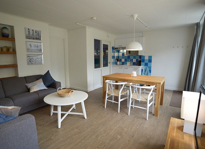 Cozy living space in Grand Hotel Opduin - Holiday home C, De Koog, Texel, with modern kitchen and dining area.