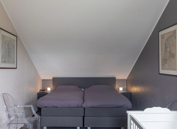 Spacious terrace at Stappeland - De Groene Boei vacation home in De Koog, Texel, ideal for outdoor dining.