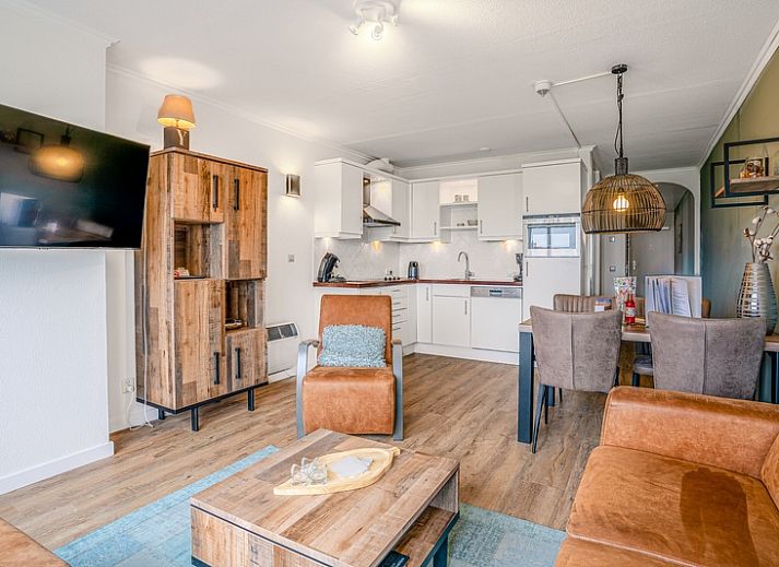 Cozy living room in Apartment Juliana 136 Island and Sea View, De Koog, Texel with a view of nature.
