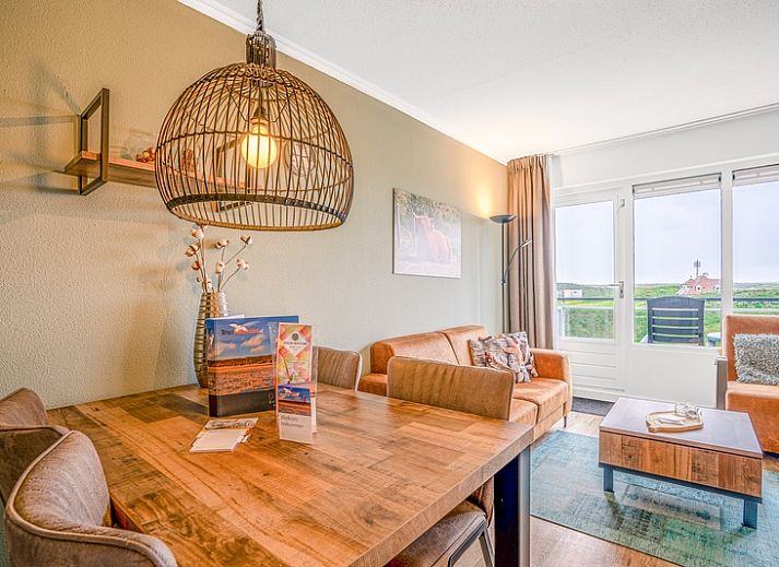 Comfortable seating area in Apartment Juliana 136 with sea view in De Koog, Texel.