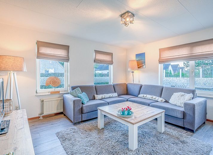 Vacation home Honeysuckle 87 in De Koog Texel with sunny exterior facade and driveway.