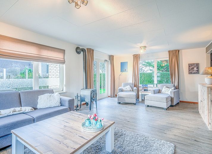 Vacation home Honeysuckle 87 in De Koog Texel with sunny exterior facade and driveway.