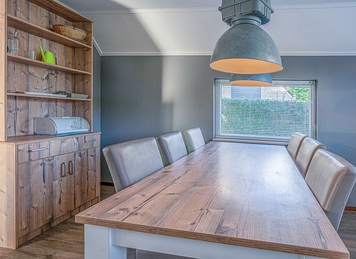 Cozy living room of Holiday home Kamperfoelie 87 in De Koog Texel with comfortable seating area.