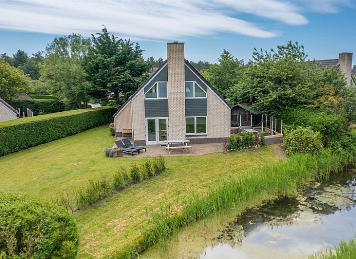 Vacation home Honeysuckle 71 in De Koog, Texel with spacious waterfront garden.