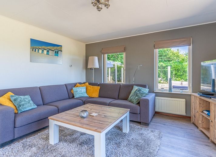 Vacation home Honeysuckle 71 in De Koog, Texel with spacious waterfront garden.