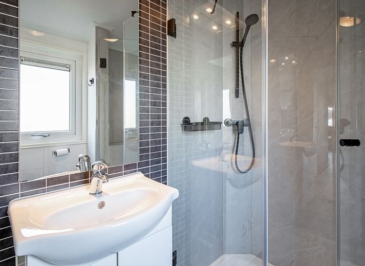 Sunny terrace at Chalet Bregkoog 7, located in picturesque De Koog on Texel, Wadden Islands.