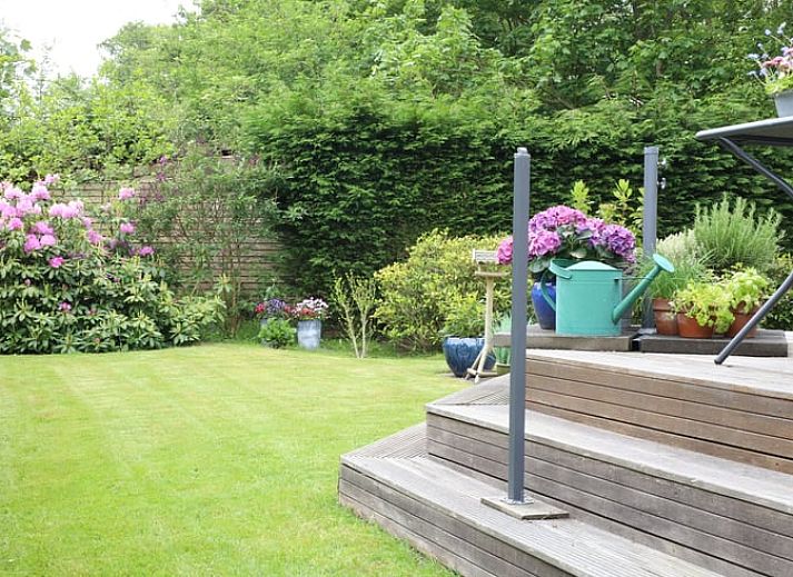 Cozy terrace of Holiday home in De Koog, ideal for outdoor meals, Texel, Wadden Islands.