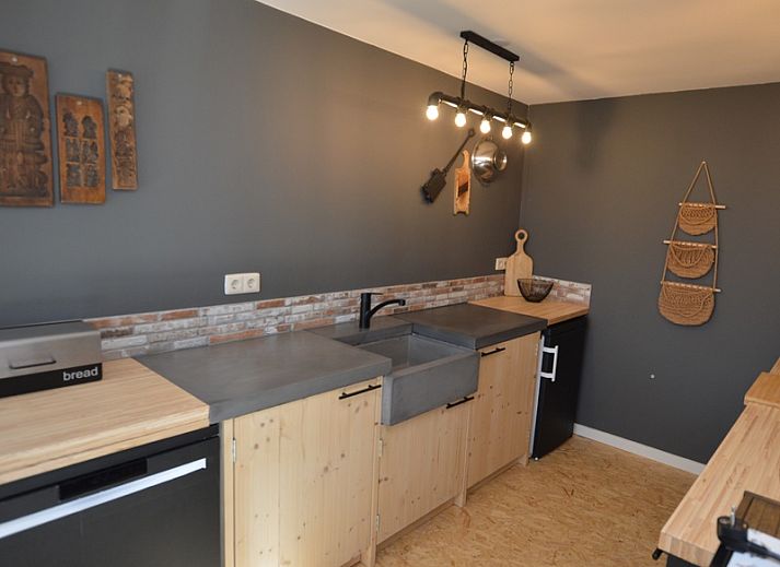 Spacious living room of Holiday home Hoog Koog 8 in De Koog Texel with lots of natural light.