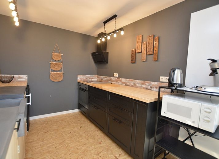 Spacious living room of Holiday home Hoog Koog 8 in De Koog Texel with lots of natural light.