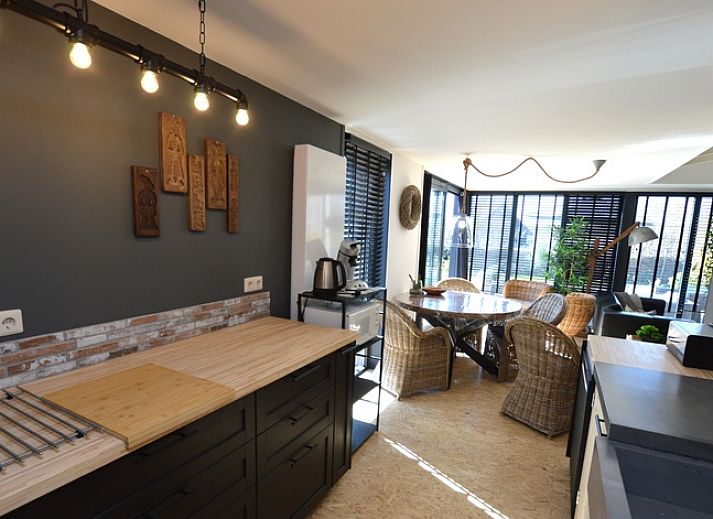 Spacious living room of Holiday home Hoog Koog 8 in De Koog Texel with lots of natural light.