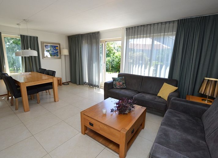 Vacation home Stappeland 163 in De Koog, Texel, offers a charming exterior with an inviting veranda.