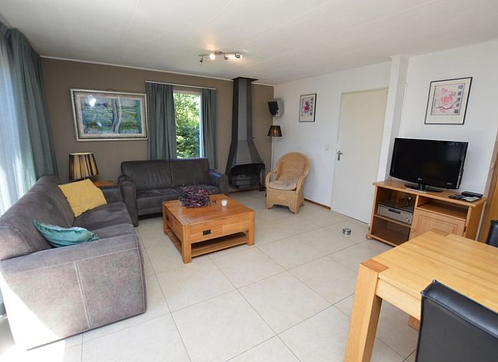 Vacation home Stappeland 163 in De Koog, Texel, offers a charming exterior with an inviting veranda.