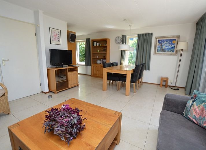 Vacation home Stappeland 163 in De Koog, Texel, offers a charming exterior with an inviting veranda.