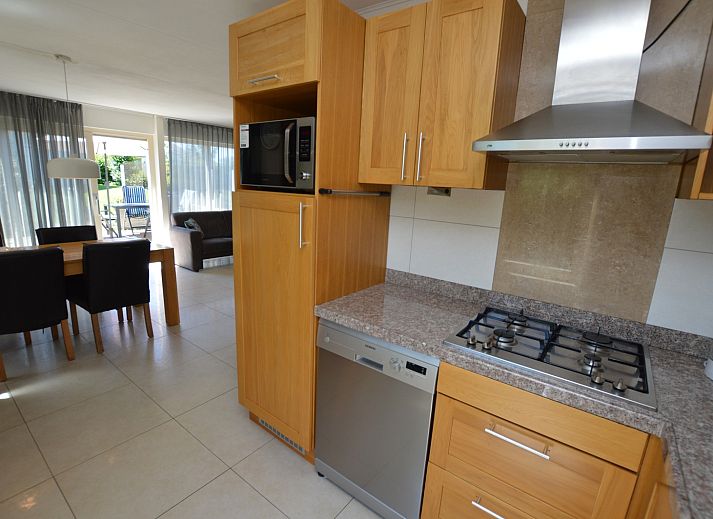 Spacious living room of Holiday home Stappeland 163, De Koog, Texel, with lots of natural light and comfortable furniture.