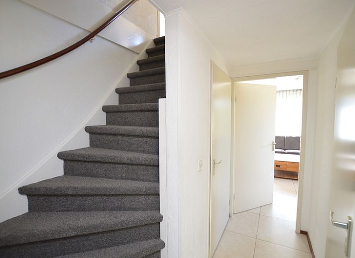 Cozy sitting area in Holiday home Stappeland 163, De Koog, Texel, perfect for relaxing after a day on the island.