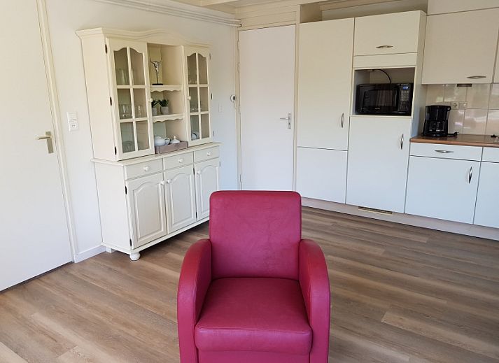 Bungalow 5100 in De Koog on Texel with sunny terrace and green surroundings.