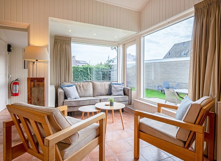 Spacious garden at Het Zandblauwtje vacation home in De Koog Texel