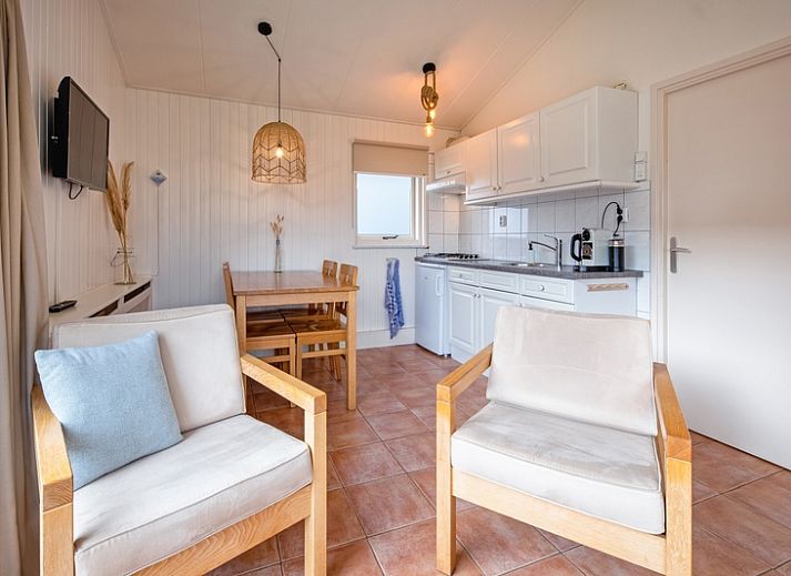 Spacious garden at Het Zandblauwtje vacation home in De Koog Texel