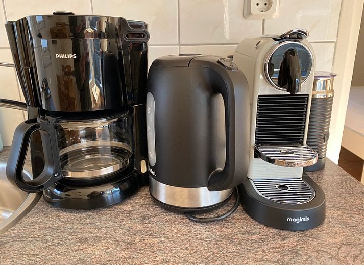 Spacious garden at Het Zandblauwtje vacation home in De Koog Texel