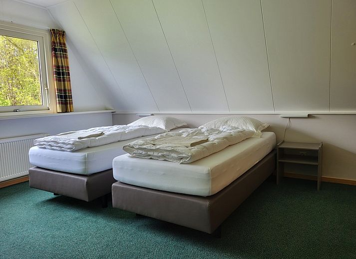 Gemuetliches Wohnzimmer in Agter Mienterglop - Ferienhaus 5103, De Koog, Texel mit Kamin.