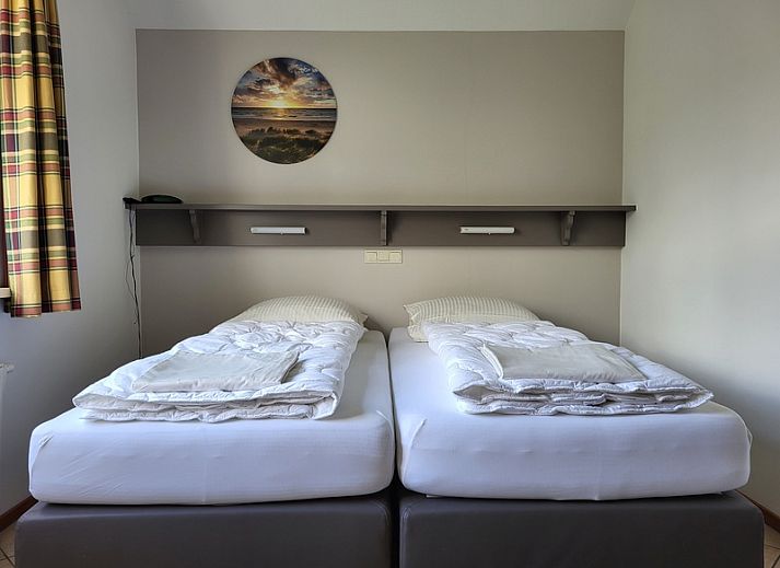 Gemuetliches Wohnzimmer in Agter Mienterglop - Ferienhaus 5103, De Koog, Texel mit Kamin.