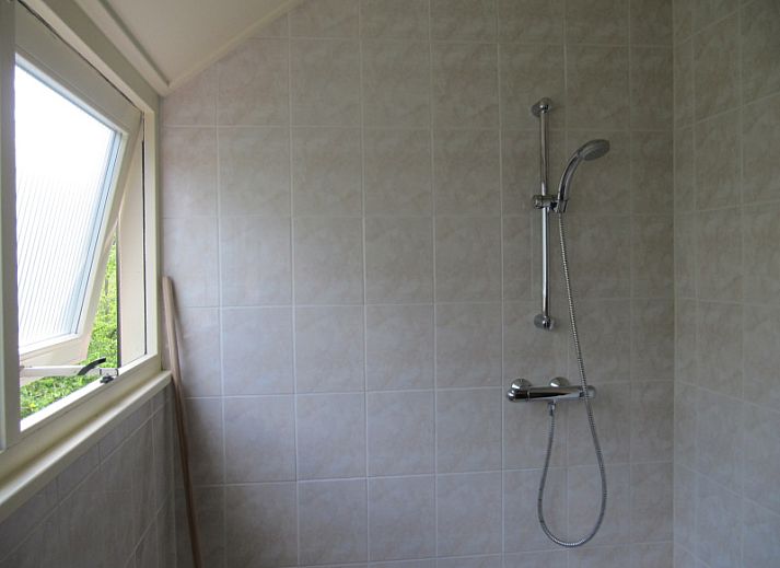 Gemuetliches Wohnzimmer in Agter Mienterglop - Ferienhaus 5103, De Koog, Texel mit Kamin.