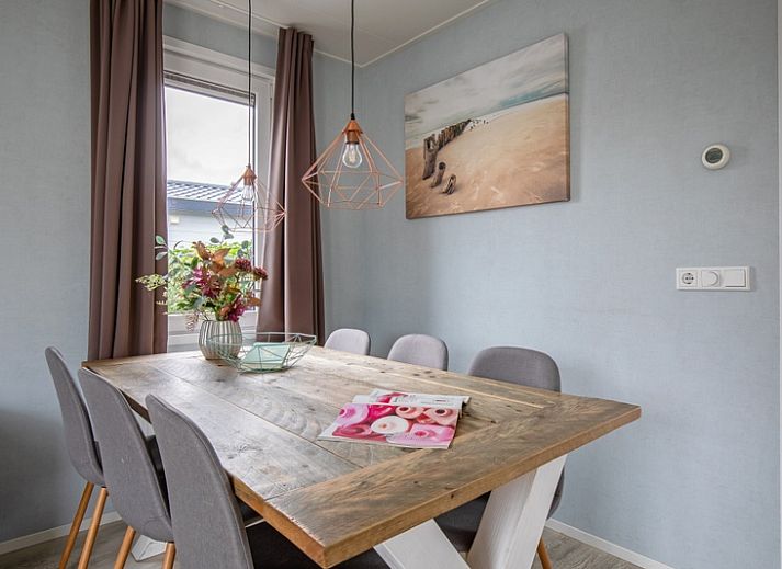 Exterior of Chalet Bregkoog 261, Chaletpark Bregkoog, De Koog, Texel. Modern architecture at sunset.