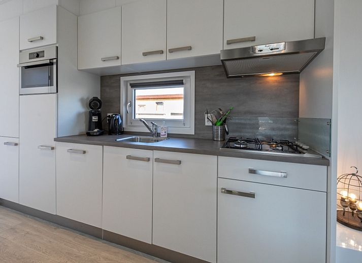 Exterior of Chalet Bregkoog 261, Chaletpark Bregkoog, De Koog, Texel. Modern architecture at sunset.