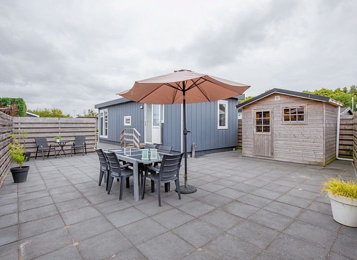 Exterior of Chalet Bregkoog 261, Chaletpark Bregkoog, De Koog, Texel. Modern architecture at sunset.