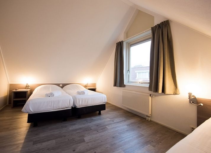 Villa 2 in De Koog Texel mit sonniger Terrasse und gruener Umgebung, ideales Ferienhaus auf den Watteninseln.