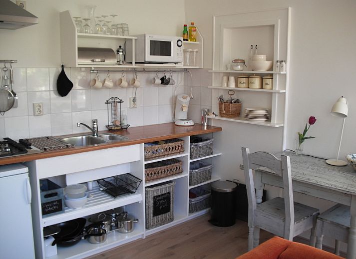 Geniessen Sie den sonnigen Garten des Ferienhauses Plevierstraat 21 in De Koog, Texel.