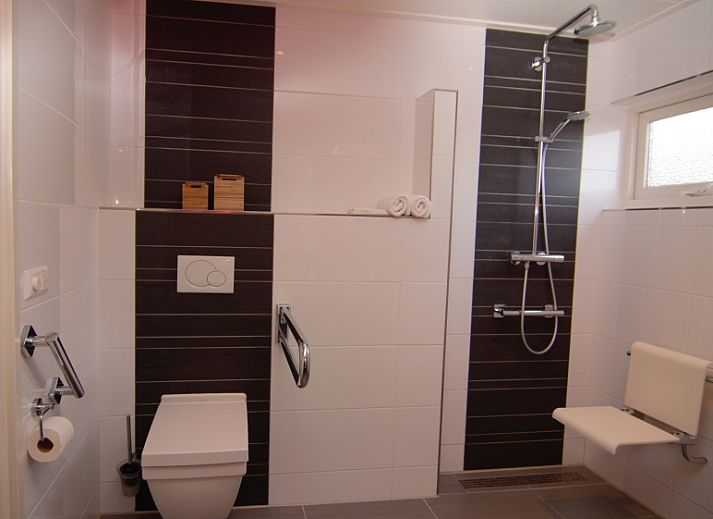 Terrasse im Stappeland - De Duinvlinder in De Koog, Texel, ideal fuer Mahlzeiten im Freien und zum Entspannen.