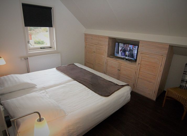 Terrasse im Stappeland - De Duinvlinder in De Koog, Texel, ideal fuer Mahlzeiten im Freien und zum Entspannen.