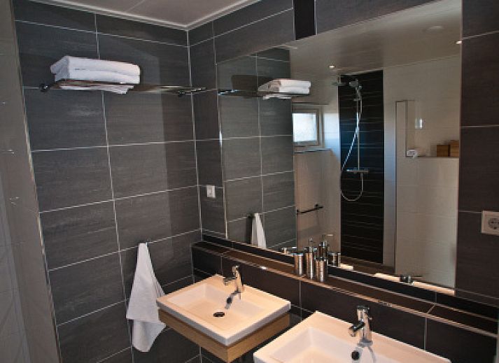 Terrasse im Stappeland - De Duinvlinder in De Koog, Texel, ideal fuer Mahlzeiten im Freien und zum Entspannen.