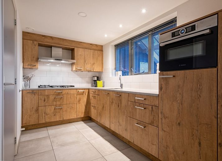 Cozy living room in Holiday Park Het Oude Dijkje - Vuurcoogh, De Koog, Texel for comfort and relaxation.