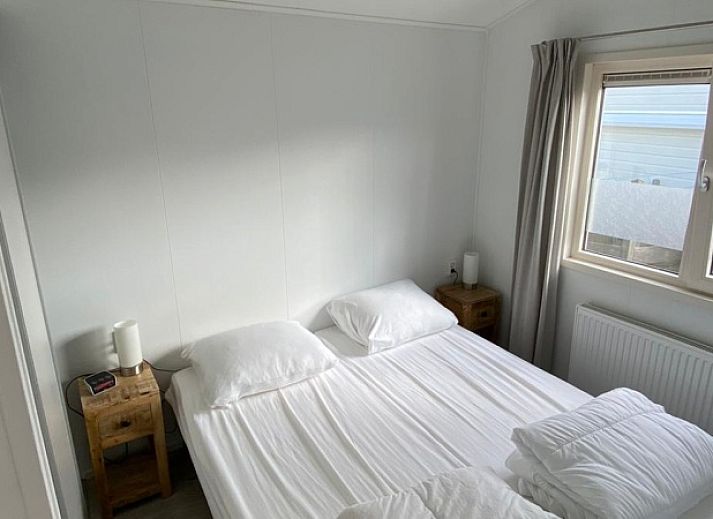 Vacation home Chalet Bregkoog 154 in De Koog, Texel, with spacious garden and terrace.