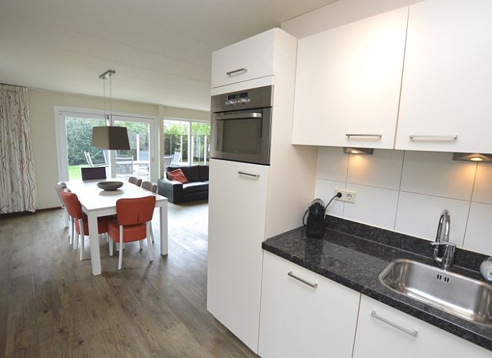 Cozy living room of Holiday home Stappeland 76 in De Koog, Texel with comfortable seating area.