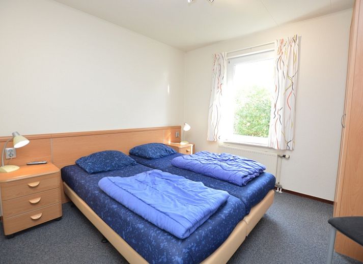 Cozy living room of Holiday home Stappeland 76 in De Koog, Texel with comfortable seating area.