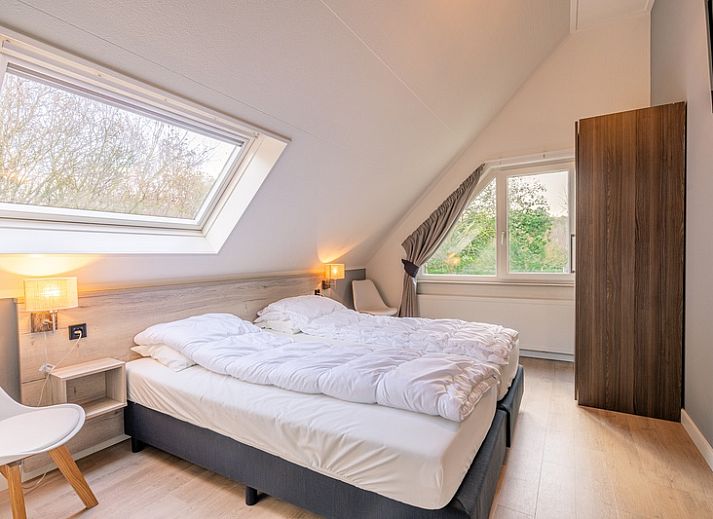 Geniessen Sie die gruene Umgebung im Ferienhaus Kamperfoelie 73, ein ideales Ferienhaus in De Koog auf Texel.