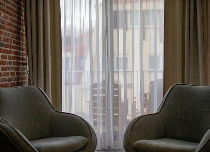 Wohnung fuer 4 bis 6 Personen in De Koog, Texel mit modernem Aeusseren und Balkon, ideal fuer Ferien auf den Watteninseln.