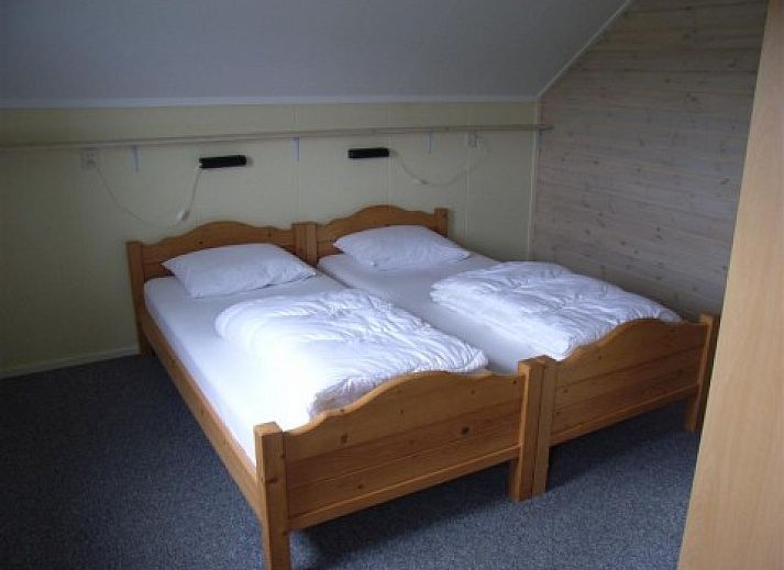 Gemtliches Wohnzimmer in Stappeland 201, De Koog, Texel mit komfortabler Sitzecke.