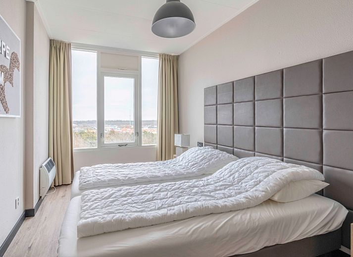 Gemuetliche Sitzecke im Appartement Juliana 174 Eilandzicht, De Koog, Texel, mit Blick auf die Natur.