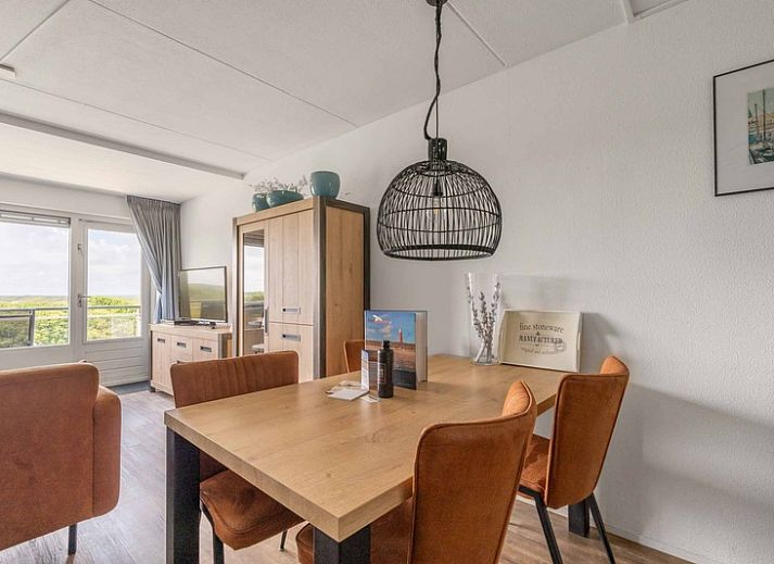 Gemuetliche Sitzecke im Apartment Juliana 096 Island and Sea View, De Koog, Texel mit Blick auf die Watteninseln.